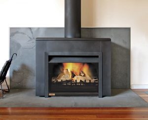 The exposed flue of a free-standing fireplace increases the heating efficiency of the fireplace with its radiant heating properties.